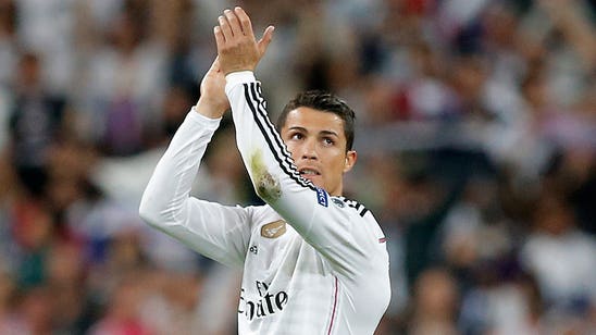 Cristiano Ronaldo gives his warm-up shirt to kid after striking him with free kick
