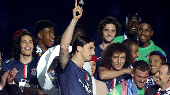 Zlatan atones for France insult during title ceremony