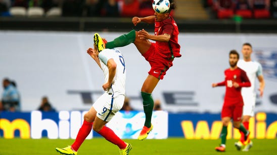 Watch Bruno Alves attempt to take off Harry Kane's head