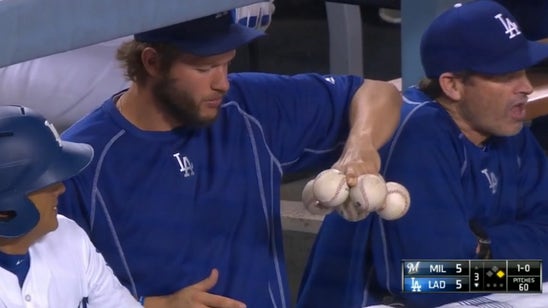 Clayton Kershaw can hold six baseballs with one hand