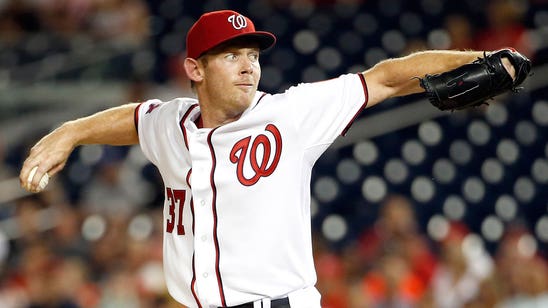 Nationals pitcher Strasburg exits early with injury to side