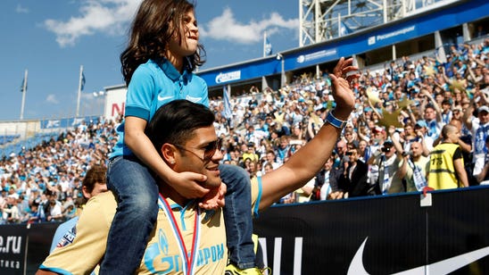Hulk blasts his goalkeeper through the net at Zenit training