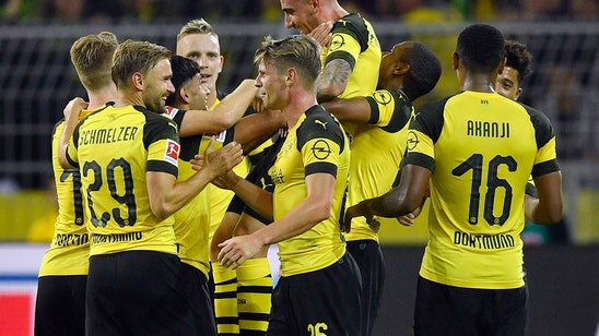 Alcacer stars in debut, seals Dortmund’s 3-1 win in Germany