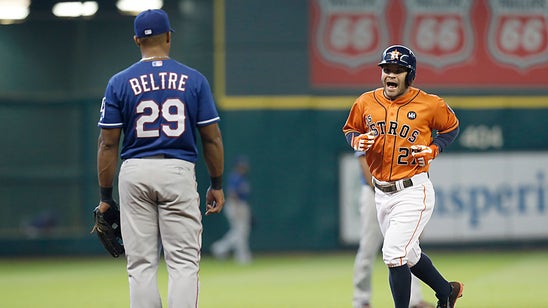 Astros hit 6 homers in win over Rangers to close gap