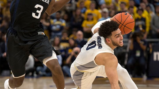 Howard and John lead Marquette to 79-69 win over Butler