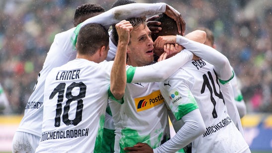 Gladbach routs Augsburg 5-1, moves top of the Bundesliga