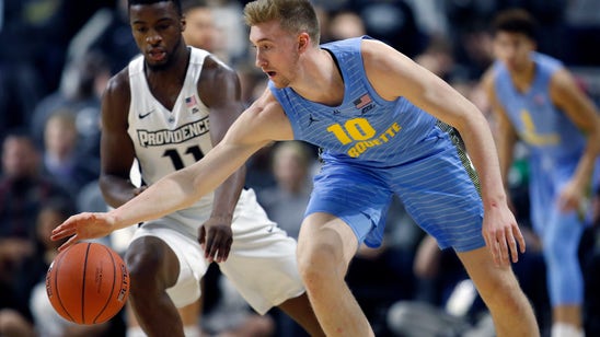 S. Hauser, Anim lead No. 11 Marquette past Providence 76-58