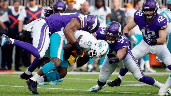 Dolphins' Gore injures left ankle against Vikings