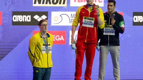 Horton applauded by fellow swimmers for stand against Sun