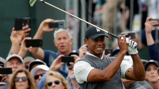 Woods posts 1st round under par at US Open in 7 years