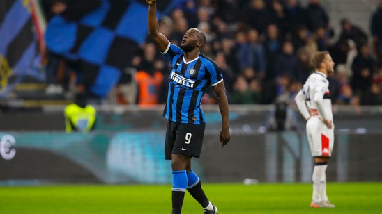 Lukaku scores 2 as Inter beats Genoa 4-0 to share lead