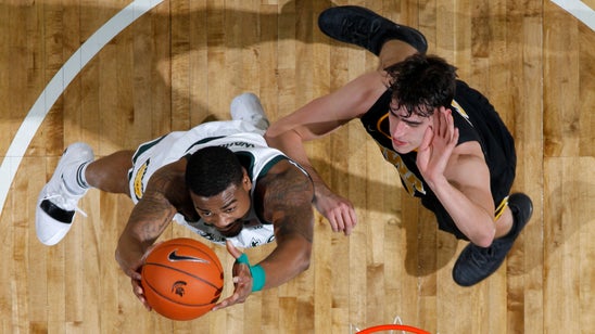 Ward scores 26, No. 10 Spartans top No. 18 Iowa 90-68