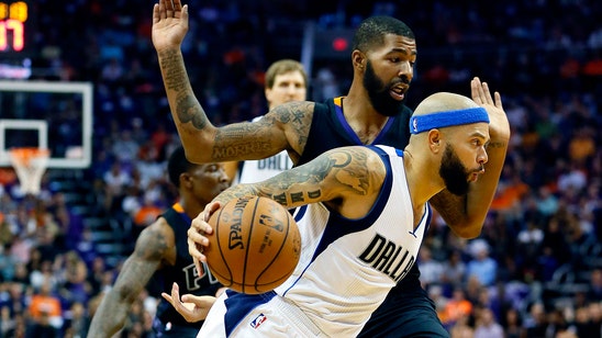 Mavs roll past Suns with 8 players in double figures