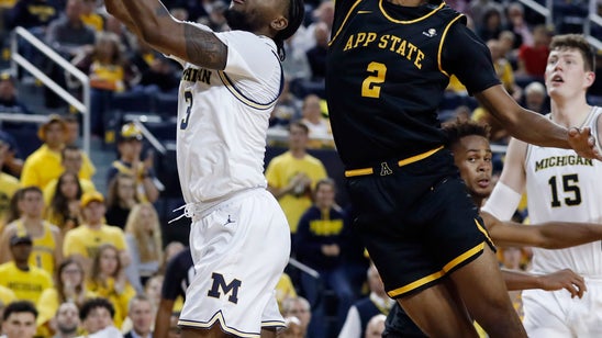 Michigan wins Howard's debut, 79-71 over Appalachian State