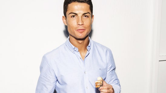 Here's Cristiano Ronaldo eating a CR7 underwear cake...
