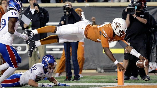 Texas finds offense in rout of winless Kansas