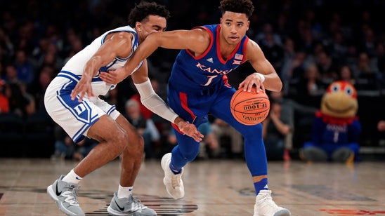 No. 4 Duke edges third-ranked Kansas 68-66
