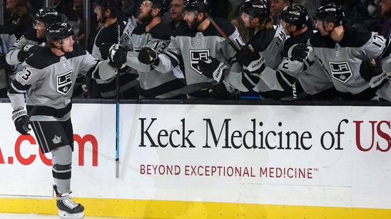 Carter helps Kings beat Flames 4-1 to snap 3-game skid