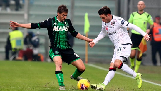 Cagliari extends unbeaten Serie A run; Balotelli on 50 goals