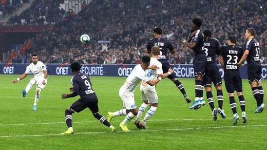 Marseille wins 6th straight league game, keeps pace with PSG