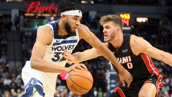 Wiggins leads Wolves past Heat 116-109 with late 3 barrage