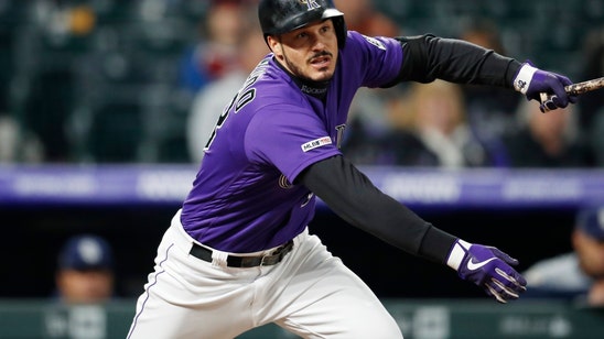 Marquez’s arm, bat lead Rockies past Padres 12-2