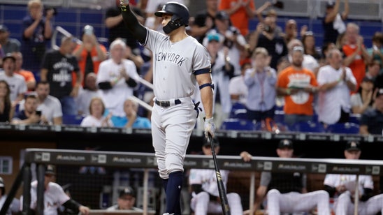 Stanton 2 hits, Chapman exits, Yank top Marlins in 12, 2-1