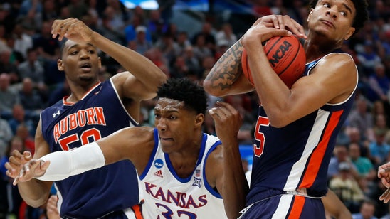 Auburn blows past Kansas 89-75 to reach Sweet 16