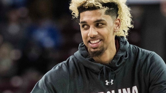 Witness details secret payments in college hoops recruiting