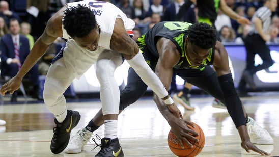 Carlton, Gilbert lead UConn to 60-58 win over South Florida