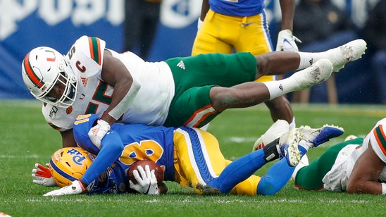 Louisville visits Miami, both teams eyeing bowl eligibility