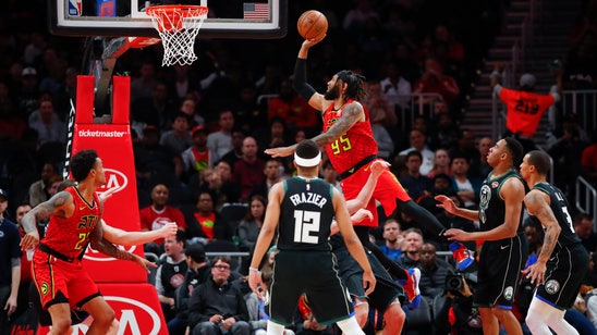 Young’s buzzer-beating jumper lifts Hawks past Bucks in OT