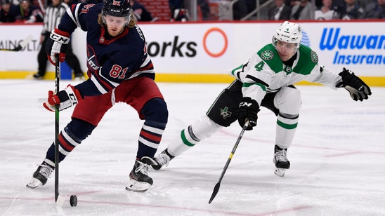Connor's goal and 2 assists help Jets beat struggling Stars