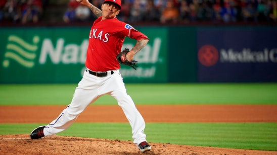 Chavez returns to Rangers, finalizes $8 million, 2-year deal