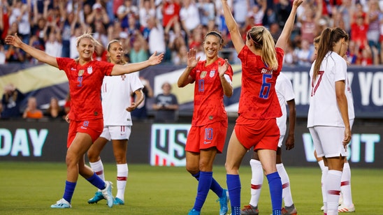 Lloyd, US women ease past Portugal in front of record crowd