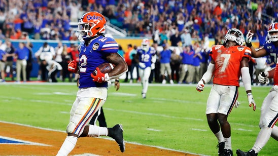 Perine leads No. 6 Gators past Virginia 36-28 in Orange Bowl