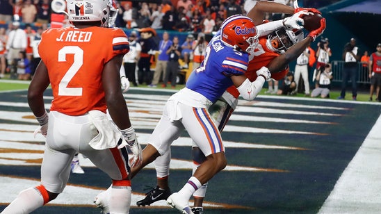 Perine leads No. 6 Gators past Virginia 36-28 in Orange Bowl