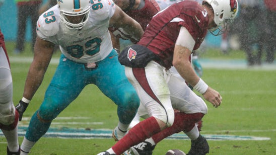 Blame the rain? Sloppy Cards lose to Dolphins, 26-23