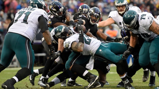 Ravens maintain momentum with win over gambling Eagles