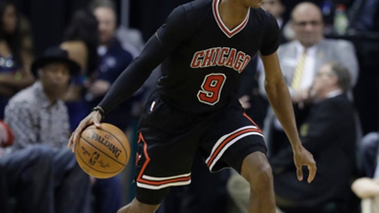 Rondo out of Bulls' lineup after being benched for poor play