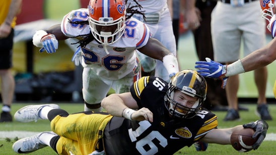 Iowa QB Beathard plays through injury in Outback Bowl loss