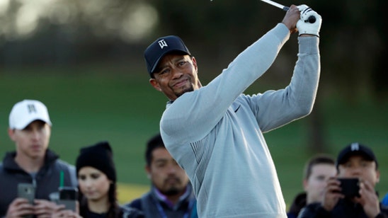 The Latest: Tiger Woods stumbles home to a 76