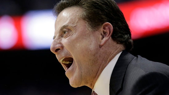 UNC: fan ejected after exchange with Louisville's Pitino