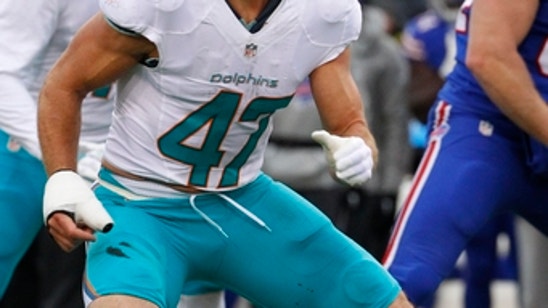 Alonso signs extension with Dolphins; Brown finishes visit
