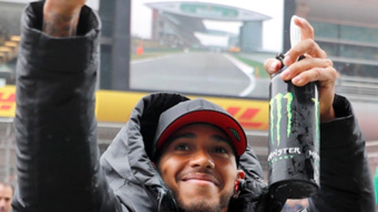 Lewis Hamilton coasts to fifth title at Chinese Grand Prix