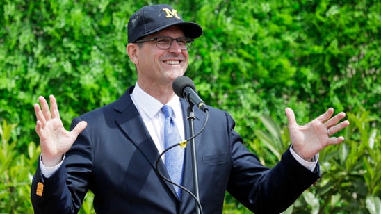 Michigan's football team tunes up for final day in Rome