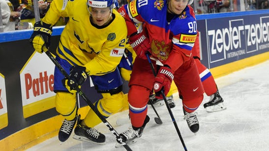 Germany stuns US 2-1 at ice worlds; Canada, Russia win