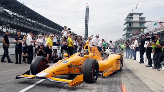 Dixon takes 3rd Indy pole with fastest speeds in 21 years