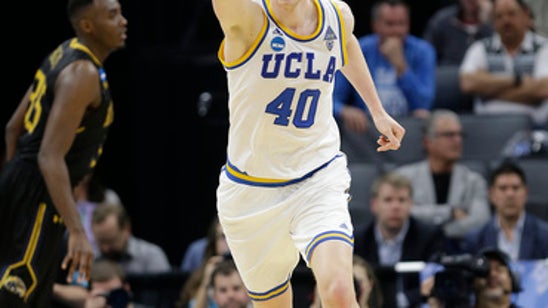UCLA's Welsh, Holiday withdraw names from NBA draft