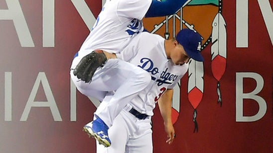 Pederson leaves game after frightening collision with Puig